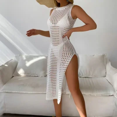 Woman in white hollow out cover-up dress